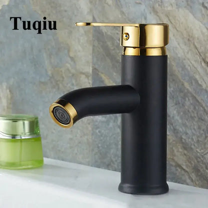 Modern matte black and gold single handle tuqiu wash basin faucet with polished brass accents by decorbites black single