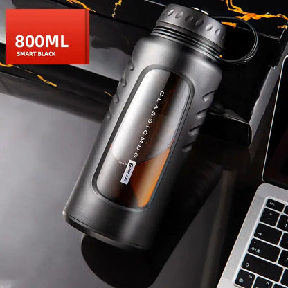 Modern matte black insulated glass water cup with 800ml capacity textured grip and classic mug branding window