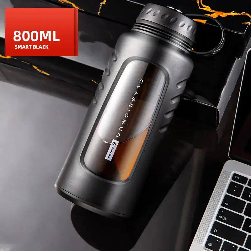 Modern matte black insulated glass water cup with 800ml capacity textured grip and classic mug branding window