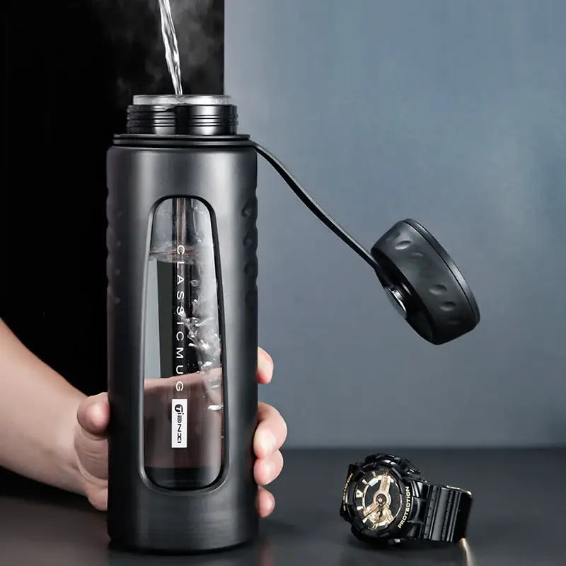 Modern matte black insulated glass water cup with transparent side window textured grip and classicmug branding