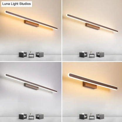 Modern matte black linear led vanity sconce with sleek finish and warm led lighting for bathroom use
