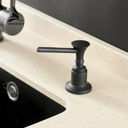 Modern matte black metal liquid soap dispenser with a sleek design and horizontal lever handle for kitchen use