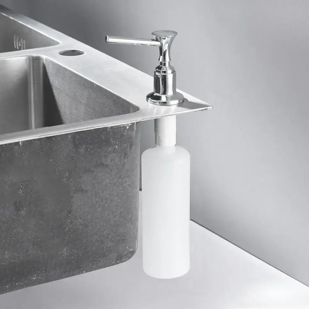 Modern matte black liquid soap dispenser with chrome finish pump and sleek cylindrical white plastic bottle for kitchen use