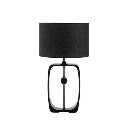 Modern matte black metal table lamp with fabric shade on sleek oval frame base for living room by decorbites designer