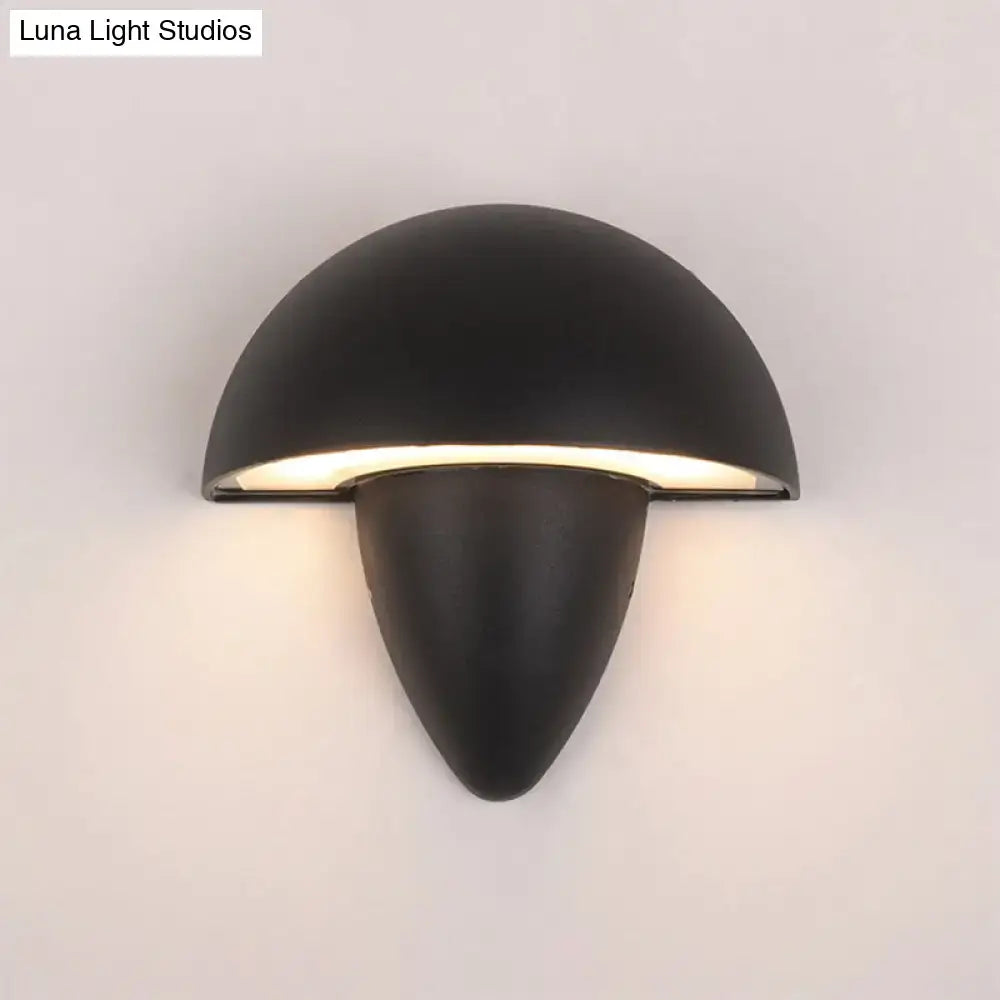 Modern matte black wall sconce with a sleek half-moon upper section and tapered base for led incandescent fluorescent use