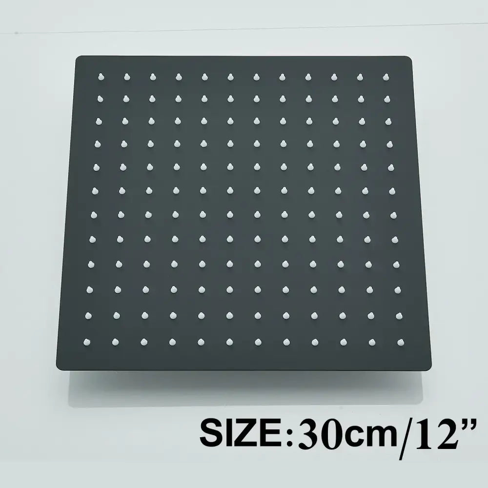Modern matte black rainfall shower head set with a black square shower head featuring white nozzles grid