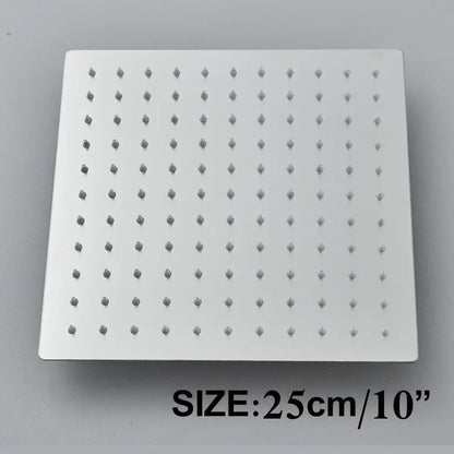 Modern matte black shower head set featuring a white square rainfall shower head with evenly spaced nozzles