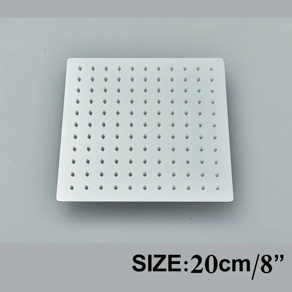 White square shower head with rounded perforations in modern matte black rainfall shower head set bathroom fixture