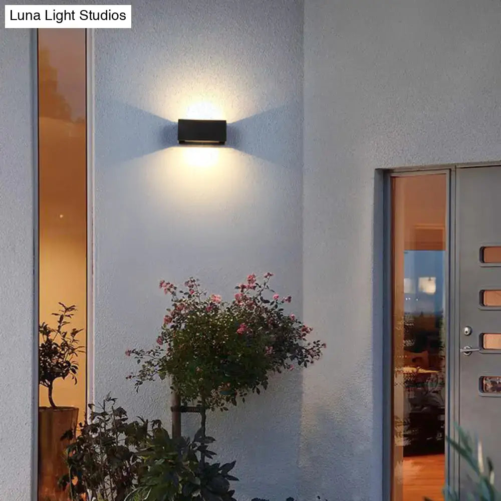 Modern matte black rectangle wall light fixture emitting warm glow for outdoor use compatible with 220v-240v 110v-120v