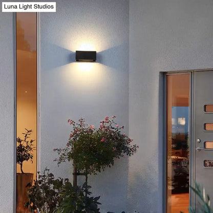 Modern matte black rectangle wall light fixture emitting warm glow for outdoor use compatible with 220v-240v 110v-120v