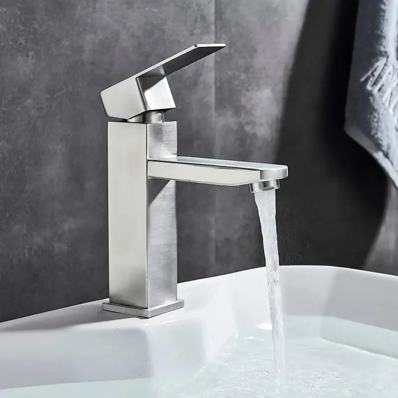 Modern brushed stainless steel basin faucet with sleek angular design and rectangular spout by decorbites basin faucet