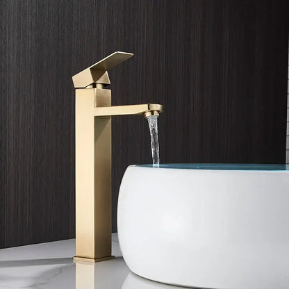 Modern gold-toned decorbites basin faucet with sleek angular design and matte finish for bathroom sink mixer