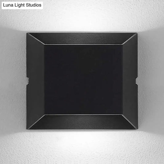Modern matte black rectangular led wall sconce with angular design and matte finish for balcony outdoor lighting