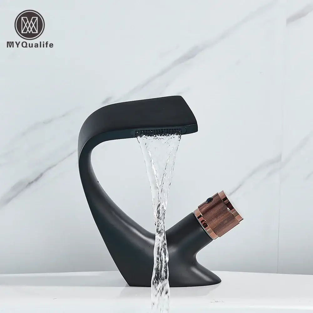 Modern matte black and rose gold brass basin faucet with waterfall spout and textured handle by myqualife black brass basin