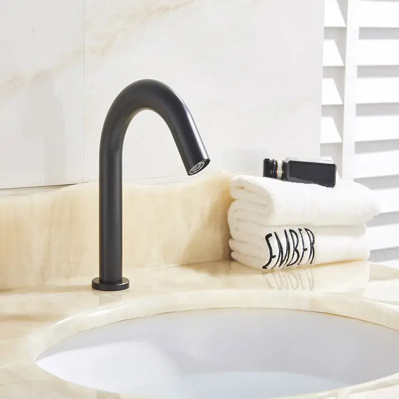 Modern matte black sensor faucet with curved spout and sleek design for bathroom basin decorbites black sensor faucet