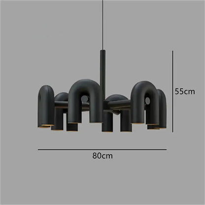 Modern matte black wall lamp with u-shaped tube arms and central rod in decorbites cirkus tube style for bedroom decor