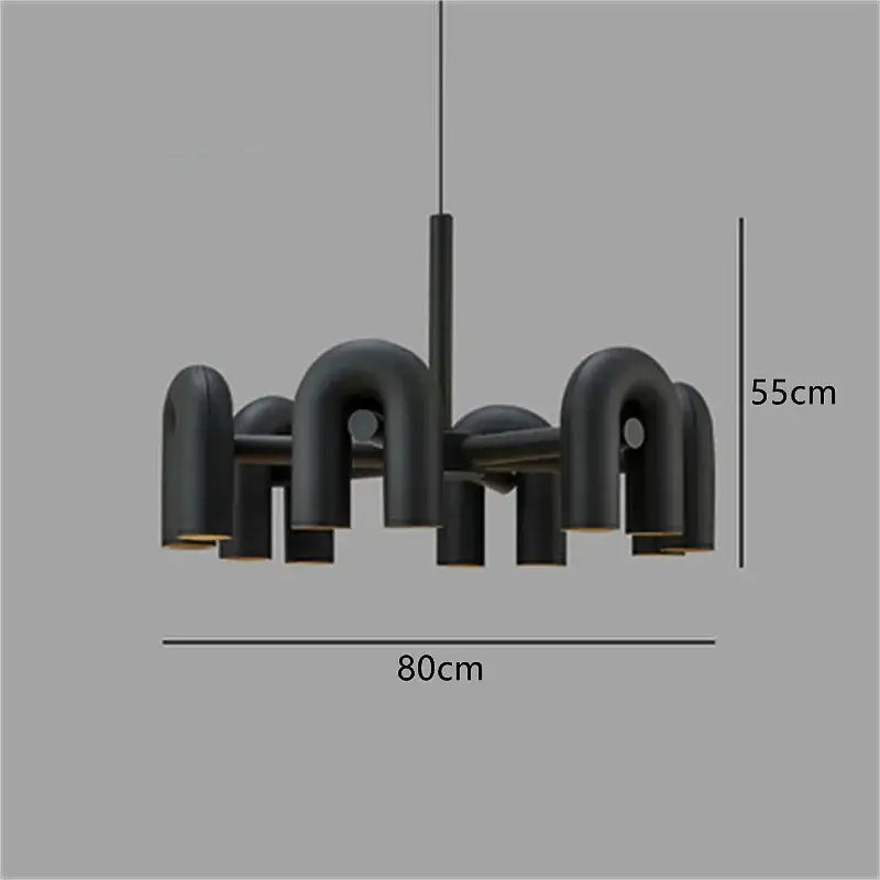 Modern matte black wall lamp with u-shaped tube arms and central rod in decorbites cirkus tube style for bedroom decor