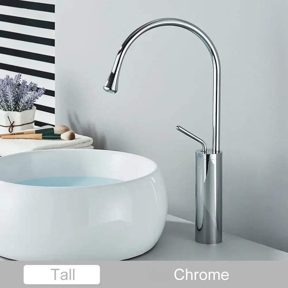 Chrome finished tall basin faucet with sleek curved spout and cylindrical base for modern decorbites gold tall style