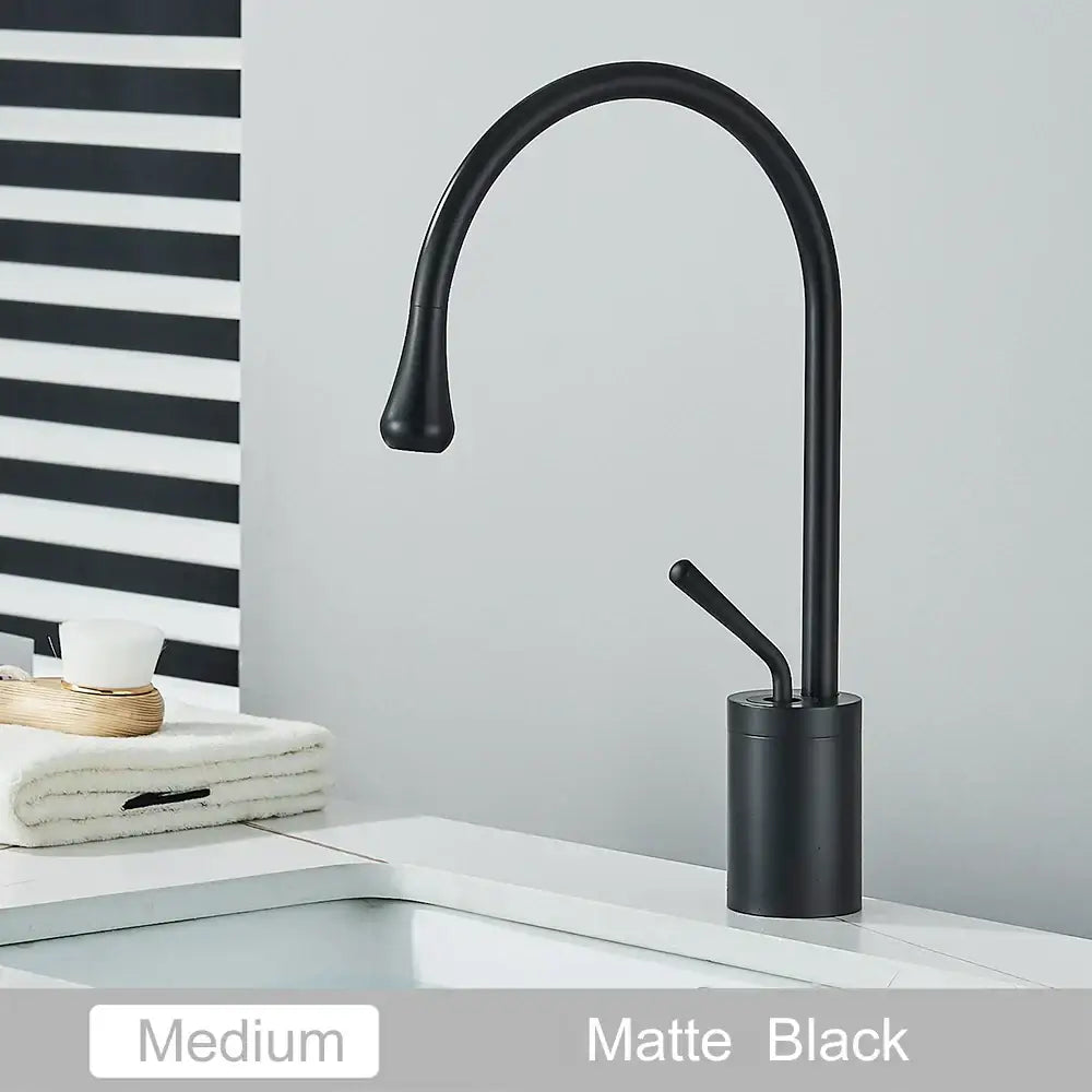 Modern matte black swivel waterfall basin faucet with sleek curved spout and cylindrical base for bathroom decorbites gold tall basin