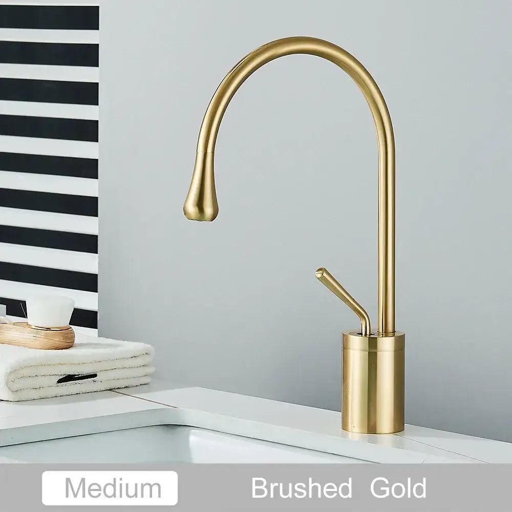 Brushed gold tall basin faucet with sleek curved spout and cylindrical base for decorbites gold tall bathroom use