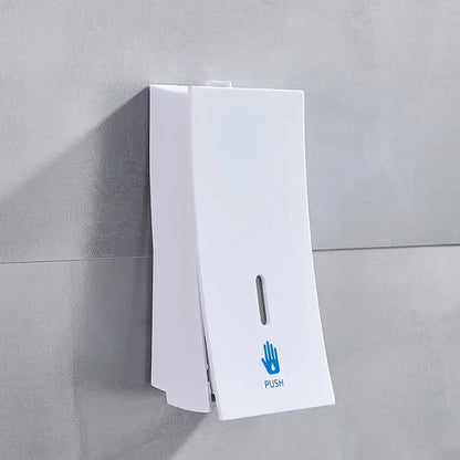 Modern matte black wall-mounted soap dispenser with white push label and blue hand icon decorbites 450ml
