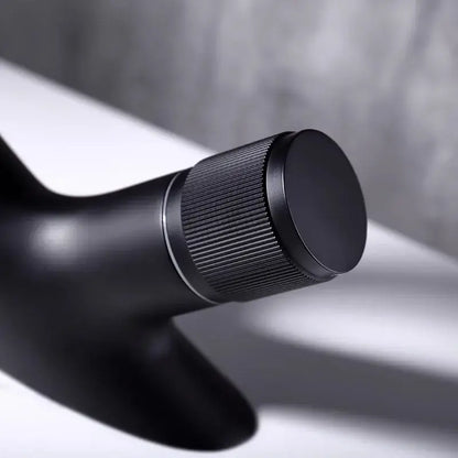 Modern matte black waterfall basin faucet with black matte finish and ribbed grip for decorbites gray basin use