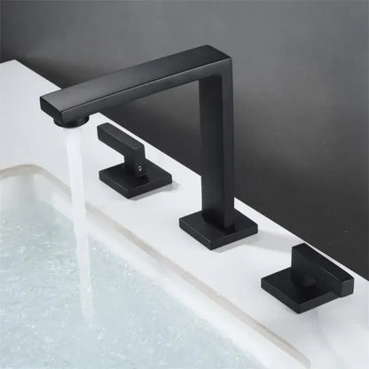 Modern matte black waterfall basin faucet with three square handles and a sleek rectangular spout for bathroom decorbites brushed gold style
