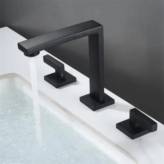 Modern matte black waterfall basin faucet with three square handles and a sleek rectangular spout for bathroom decorbites brushed gold style