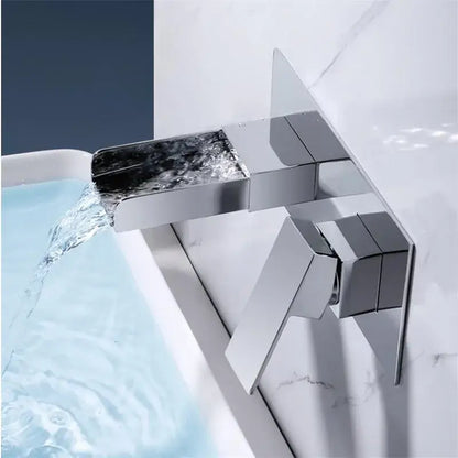 Modern chrome-finished waterfall basin mixer tap with angular geometric design for bathroom wall mounted use