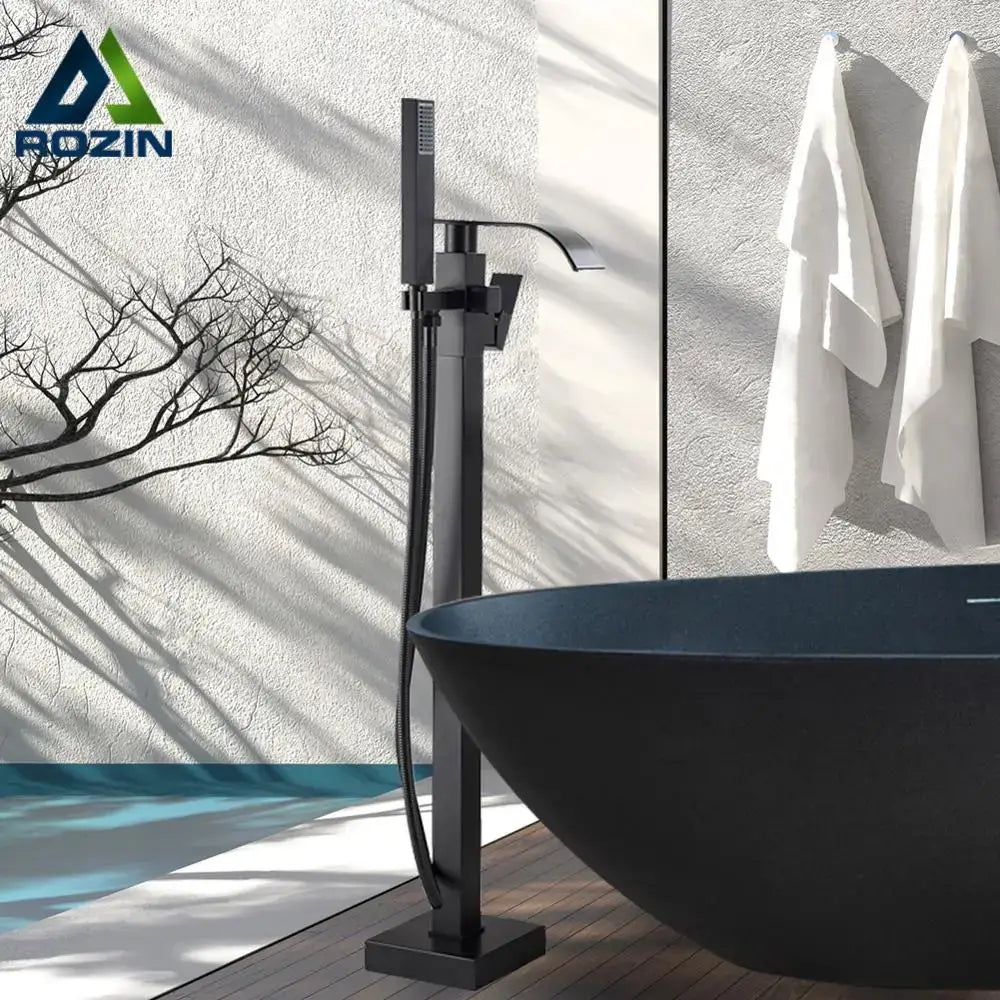 Modern matte black freestanding bathtub faucet with waterfall design and integrated handheld shower by decorbites matte black