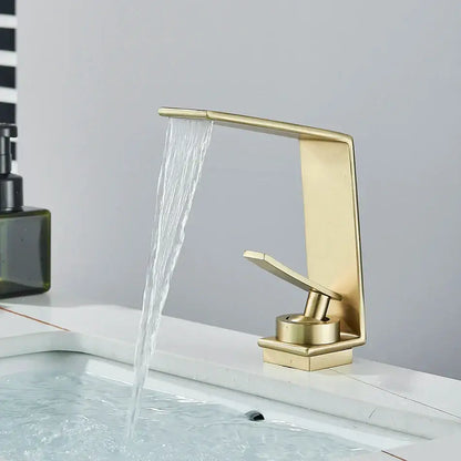 Modern matte black decorbites basin faucet with gold-toned waterfall design and brushed metal finish for bathroom use