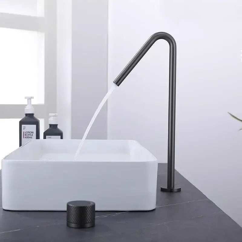 Modern matte brushed black basin faucet with sleek curved spout and textured knob for bathroom decorbites brushed black design