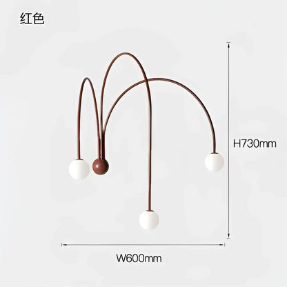 Modern matte copper glass ball wall lamp with red arc-shaped arms and white spherical bulbs for living room decorbites glass ball