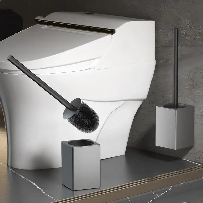 Modern matte gray and black metal toilet brush holder set with dense bristles and sleek brush holder design