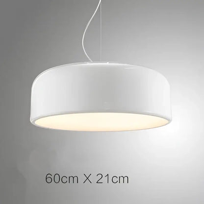 A sleek modern white pendant light with a warm glow in a decorbites colorful macaron ceiling chandelier design