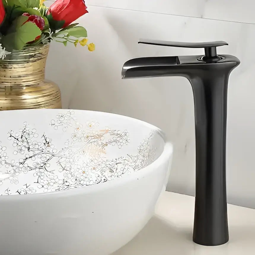 Modern matte grey waterfall brass basin faucet with black matte finish and sleek flat rectangular spout handle by decorbites