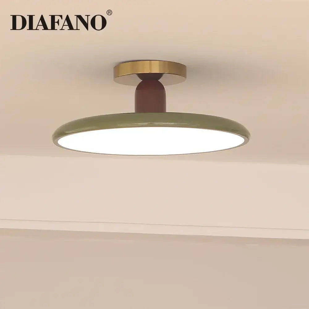 Olive green ceramic led ceiling light with brass-finished mounting ring and dark brown stem for living room use