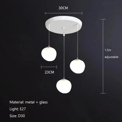 Modern matte white glass pendant light with three spherical globes and metal hardware for dining room decorbites gregg glass pendant
