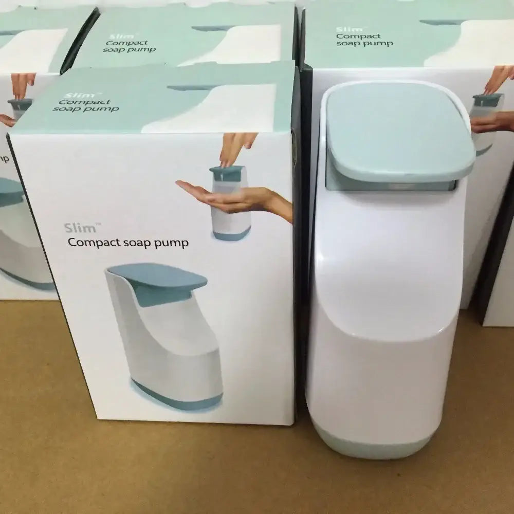 A sleek modern matte white and light blue plastic soap pump dispenser designed for kitchen space saving