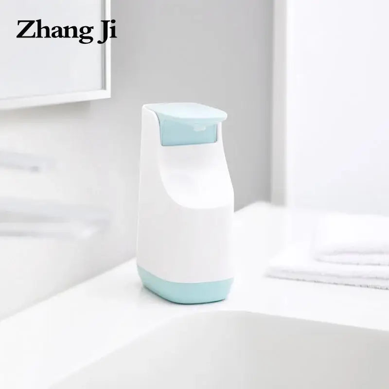 Modern matte white and teal plastic soap pump dispenser with sleek design for kitchen space-saving use