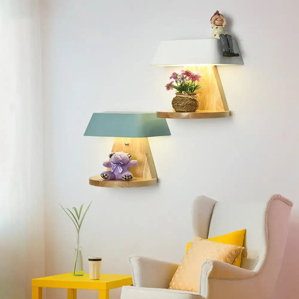 Two modern metal wall sconces with wooden backplates featuring white and teal fabric shades for living room lighting fixtures