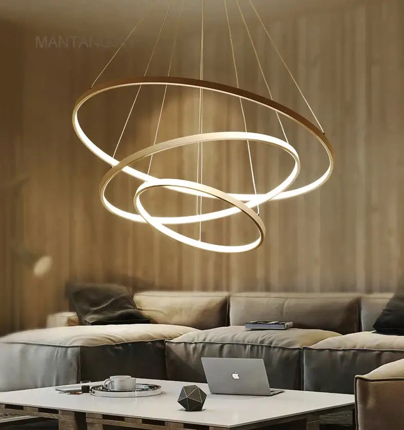 Modern metallic circle rings led pendant lamp with three interlocking metallic rings and warm led illumination for dining room decorbites circle rings pendant lamp