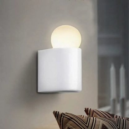 White square wall lamp with glowing milk glass ball suitable for small medium bedroom sconcelight use