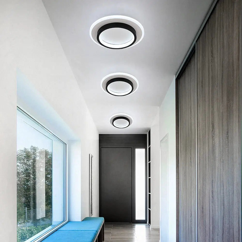 Modern minimalist black acrylic led ceiling lamp with sleek circular design and bright white illumination for bedroom decorbites acrylic led