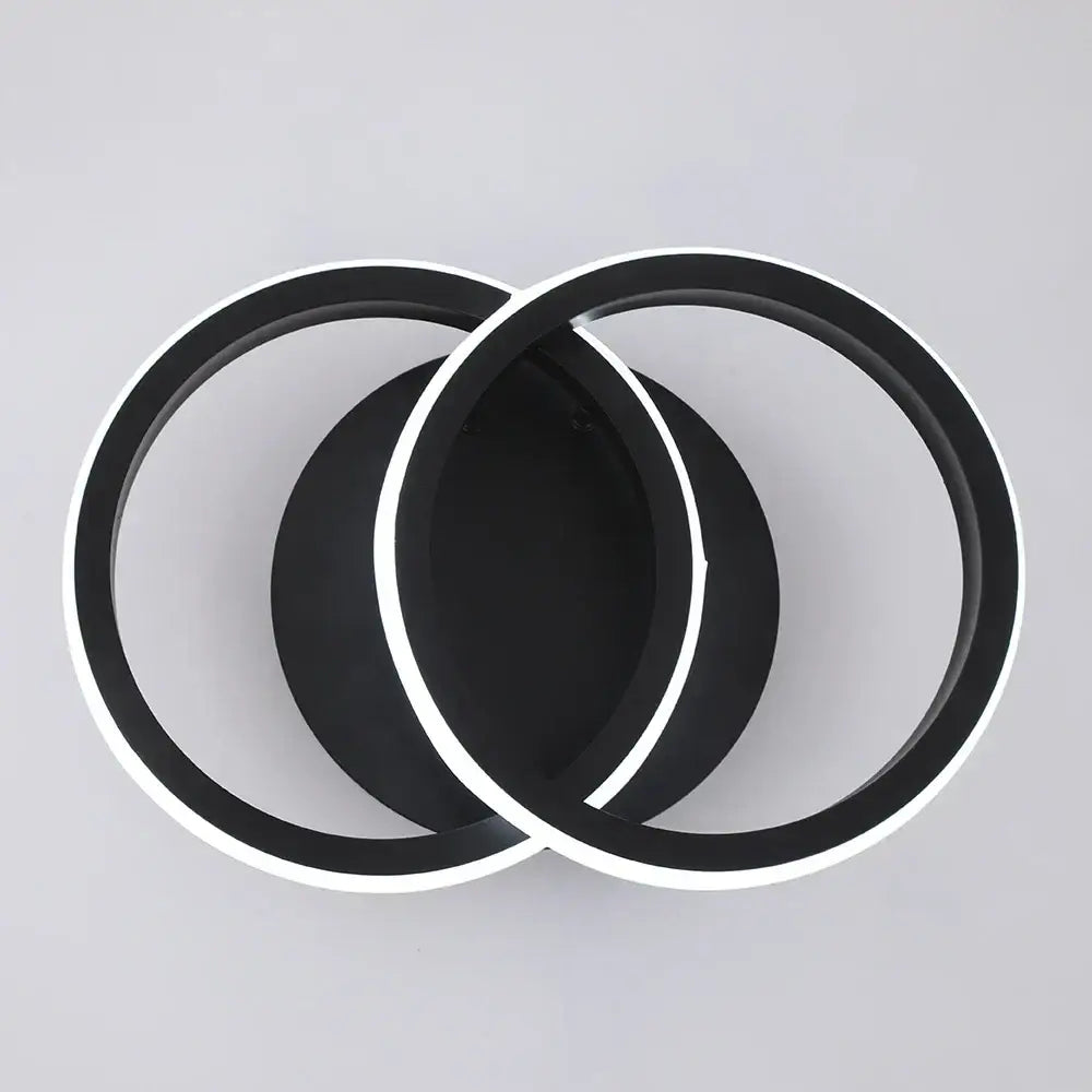 Modern minimalist black acrylic led ceiling lamp with sleek overlapping circular rings for stylish bedroom lighting decorbites acrylic led
