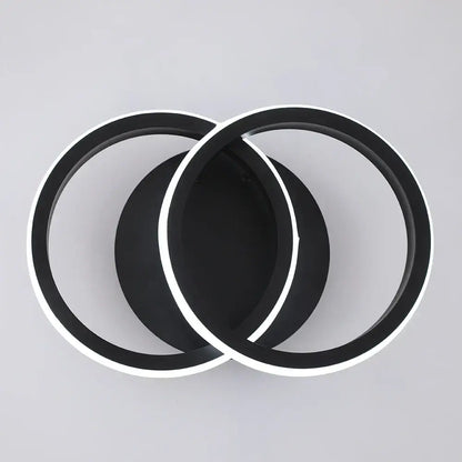 Modern minimalist black acrylic led ceiling lamp with sleek overlapping circular rings for stylish bedroom lighting decorbites acrylic led