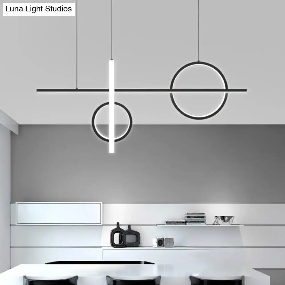 Modern black and white geometric pendant light made of acrylic with minimalist circular and linear designs for island suspension