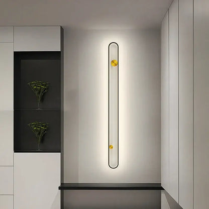 Modern minimalist black acrylic wall lamp with sleek metal frame and golden spherical accents for bedroom decorbites led black