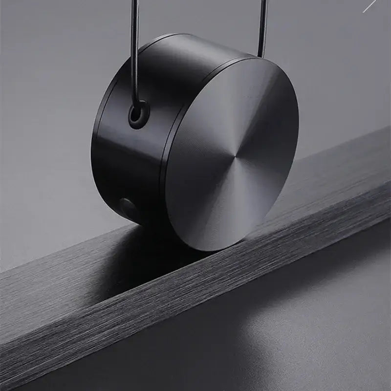 Black cylindrical pendant with brushed metal finish and hanging wire in modern minimalist decorbites dimmable led ceiling chandelier