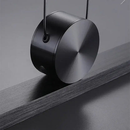 Black cylindrical pendant with brushed metal finish and hanging wire in modern minimalist decorbites dimmable led ceiling chandelier